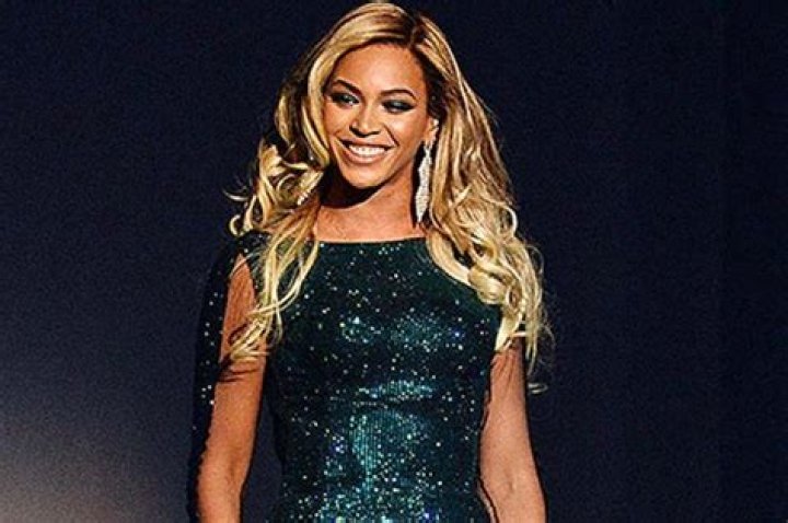 Beyoncé Stuns In Satin Green Dress With Plunging Black Top In Sexy New Photos